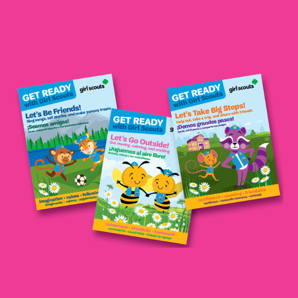 Older girl with ponytail standing outside wearing gray shirt.