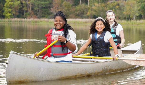 Three girls in a canoe